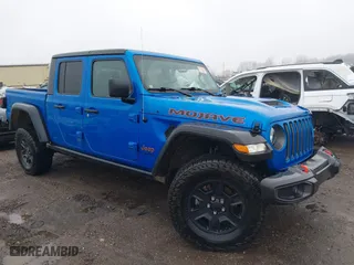2022 Jeep Gladiator Mojave with VIN 1C6JJTEG1NL128530, listed as a IAAI auction lot 41111344 with 56,119 mi miles. Bid and sale history available at carsss.com. Image 1.