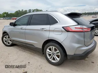 2020 Ford Edge SEL with VIN 2FMPK3J90LBA71592, listed as a Copart auction lot 62362655 with 100,040 mi miles and Salvage title. Bid and sale history available at DreamBid. Image 2.