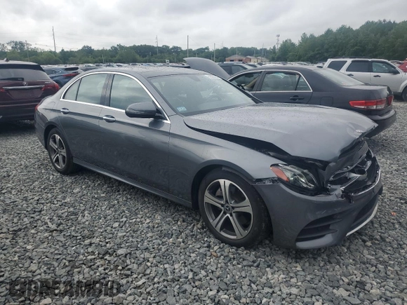 2019 Mercedes-Benz E 300 with VIN WDDZF4KB7KA553856, listed as a Copart auction lot 61025735 with 59,001 mi miles and Salvage title. Bid and sale history available at DreamBid. Image 4.