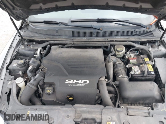 2014 Ford Taurus SHO with VIN 1FAHP2KTXEG160800, listed as a IAAI auction lot 42083237 with 75,048 mi miles. Bid and sale history available at carsss.com. Image 10.