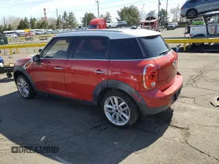 2014 MINI Countryman with VIN WMWZB3C56EWR41819, listed as a Copart auction lot 48149985 with 93,784 mi miles and Salvage Title. Bid and sale history available at DreamBid. Image 2.