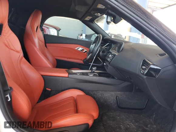 2020 BMW Z4 sDrive30i with VIN WBAHF3C0XLWW60530, listed as a Copart auction lot 57099555 with 20,464 mi miles and Salvage title. Bid and sale history available at DreamBid. Image 8.