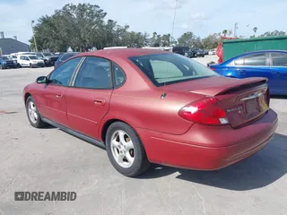 2002 Ford Taurus SES Standard with VIN 1FAFP55S42A135871, listed as a IAAI auction lot 40822596 with 185,605 mi miles. Bid and sale history available at carsss.com. Image 3.