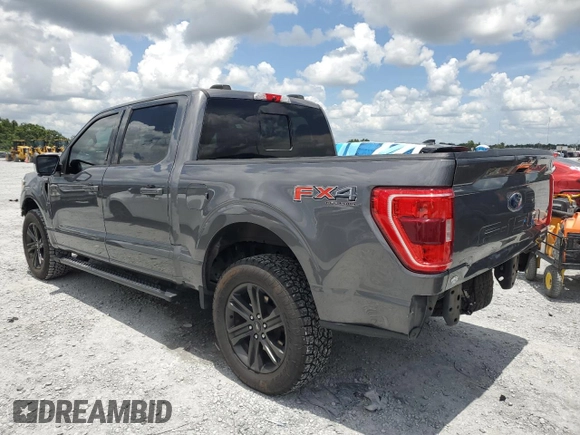 2021 Ford F-150 XL with VIN 1FTFW1E87MFC00633, listed as a Copart auction lot 65318235 with 91,264 mi miles and Salvage title. Bid and sale history available at DreamBid. Image 2.