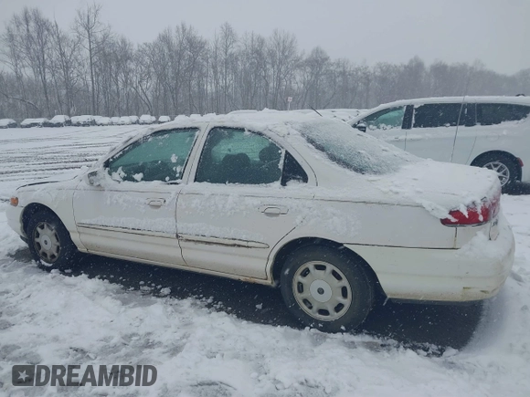 1996 Mercury Mystique z VIN 1MELM653XTK605481, wystawiony jako IAAI lot #41543215 z przebiegiem 120 988 mil mil oraz . Historia ofert i sprzedaży dostępna na DreamBid. Obrazek 6.