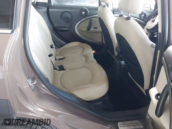 2012 MINI Countryman with VIN WMWZB3C51CWM04563, listed as a IAAI auction lot 42564564 with 95,760 mi miles and . Bid and sale history available at DreamBid. Image 8.