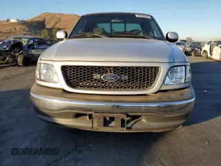 2001 Ford F-150 XL with VIN 2FTRX07L51CA91232, listed as a Copart auction lot 88556635 with 268,582 mi miles and Salvage Title. Bid and sale history available at carsss.com. Image 5.