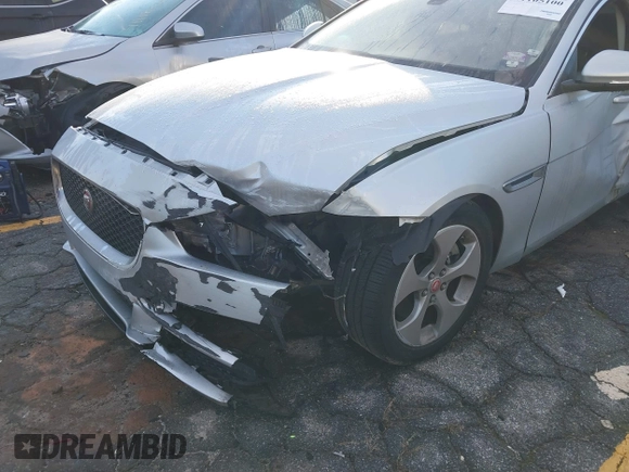 2018 Jaguar XE with VIN SAJAR4FN0JCP33509, listed as a IAAI auction lot 41105100 with 74,603 mi miles and . Bid and sale history available at DreamBid. Image 6.