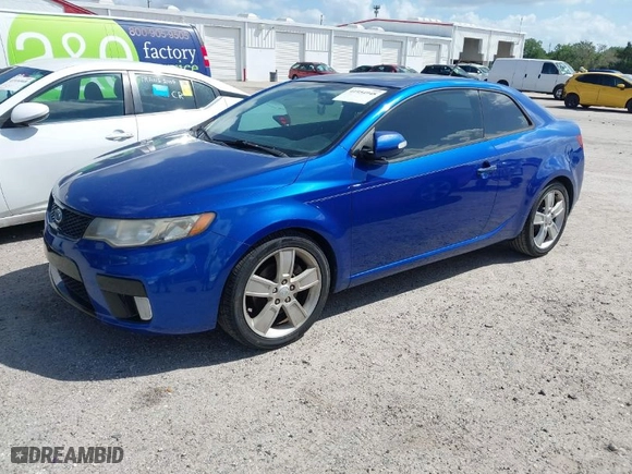 2010 Kia Forte Koup SX with VIN KNAFW6A35A5243146, listed as a IAAI auction lot 41954948 with 101765 miles. Bid and sale history available at carsss.com. Image 2.