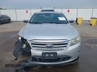 2011 Ford Taurus Limited z VIN 1FAHP2FW9BG118585, wystawiony jako IAAI lot #42124229 z przebiegiem 182 096 mil mil oraz . Historia ofert i sprzedaży dostępna na DreamBid. Obrazek 12.