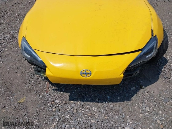 2015 Scion FR-S with VIN JF1ZNAA11F8706772, listed as a IAAI auction lot 39686329 with 21,298 mi miles. Bid and sale history available at carsss.com. Image 6.
