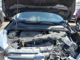 2017 Ford Escape SE z VIN 1FMCU0GD9HUD28110, wystawiony jako IAAI lot #41903505 z przebiegiem 66 808 mil mil oraz . Historia ofert i sprzedaży dostępna na DreamBid. Obrazek 10.