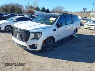 2021 GMC Yukon XL Denali with VIN 1GKS2JKT1MR401207, listed as a IAAI auction lot 41242619 with 87,902 mi miles and . Bid and sale history available at carsss.com. Image 17.