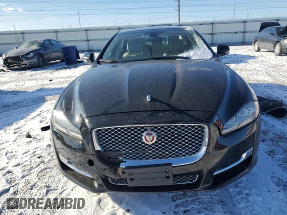 2016 Jaguar XJ Portfolio with VIN SAJWA2G78G8V94534, listed as a Copart auction lot 86926944 with 144,093 mi miles and Salvage title. Bid and sale history available at DreamBid. Image 5.