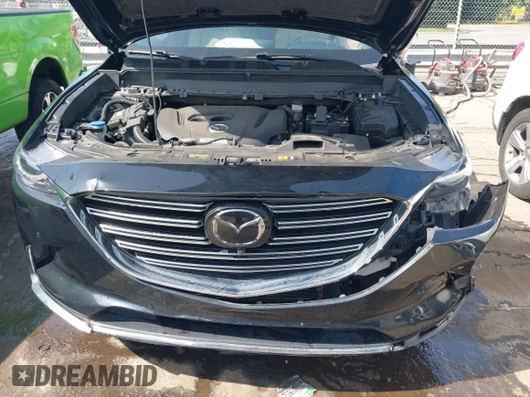 2021 Mazda CX-9 Carbon Edition with VIN JM3TCBDY3M0524241, listed as a IAAI auction lot 42538127 with 50,533 mi miles and . Bid and sale history available at DreamBid. Image 10.