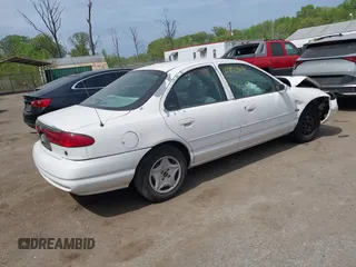 1998 Ford Contour с VIN 1FAFP6537WK249099, выставлен на аукционе IAAI как лот 42112504 с пробегом 83 875 миль миль и . История ставок и продаж доступна на DreamBid. Изображение 4.