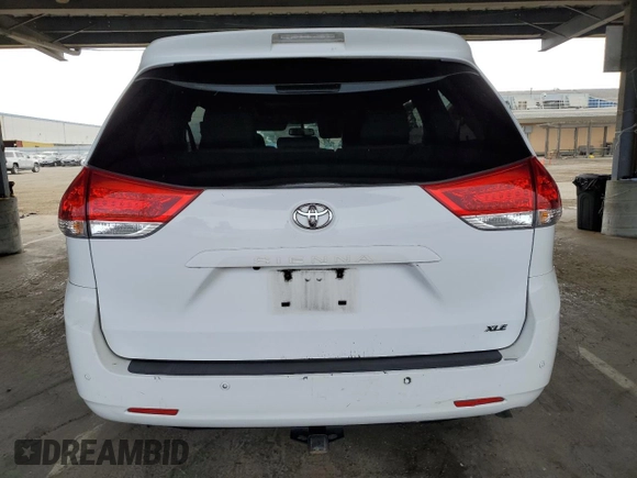 2012 Toyota Sienna XLE AAS with VIN 5TDYK3DC7CS275496, listed as a Copart auction lot 62612815 with 130,027 mi miles and Salvage title. Bid and sale history available at DreamBid. Image 6.