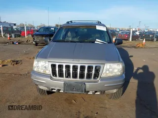2001 Jeep Grand Cherokee Limited with VIN 1J4GW58N61C670589, listed as a IAAI auction lot 41817712 with 185,905 mi miles. Bid and sale history available at carsss.com. Image 6.
