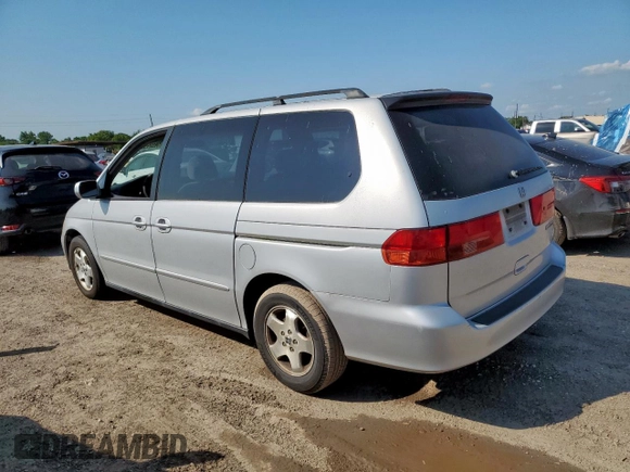 2001 Honda Odyssey EX with VIN 2HKRL18641H619203, listed as a Copart auction lot 59329555 with 180,058 mi miles and Clean title. Bid and sale history available at DreamBid. Image 2.