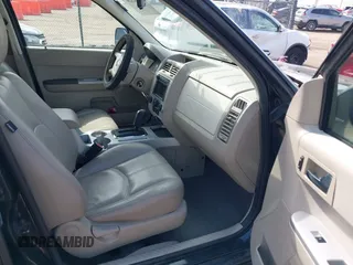 2008 Mercury Mariner z VIN 4M2CU39H78KJ39855, wystawiony jako IAAI lot #41892329 z przebiegiem 150 465 mil mil oraz . Historia ofert i sprzedaży dostępna na DreamBid. Obrazek 5.