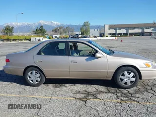 2001 Toyota Camry CE with VIN JT2BG22KX10559757, listed as a IAAI auction lot 41823719 with 72,775 mi miles. Bid and sale history available at carsss.com. Image 13.