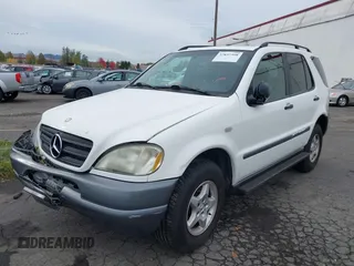 1998 Mercedes-Benz M-Class with VIN 4JGAB54E0WA005344, listed as a IAAI auction lot 37837508 with 159,933 mi miles. Bid and sale history available at carsss.com. Image 2.