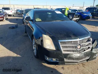 2011 Cadillac CTS Coupe Performance with VIN 1G6DK1ED9B0130927, listed as a IAAI auction lot 41414803 with 147,299 mi miles. Bid and sale history available at carsss.com. Image 1.