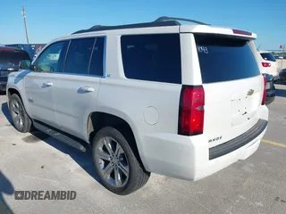 2018 Chevrolet Tahoe LT with VIN 1GNSCBKC7JR101043, listed as a IAAI auction lot 42192481 with 152,831 mi miles and . Bid and sale history available at DreamBid. Image 3.