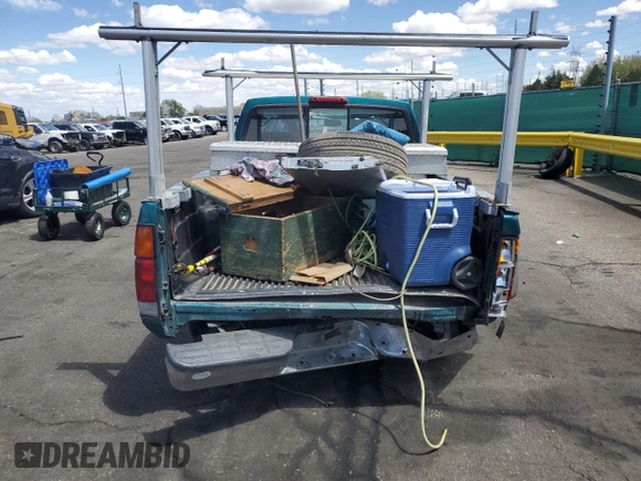 1997 Nissan Frontier XE with VIN 1N6SD11SXVC332100, listed as a Copart auction lot 54330245 with 203,959 mi miles and Salvage title. Bid and sale history available at DreamBid. Image 6.