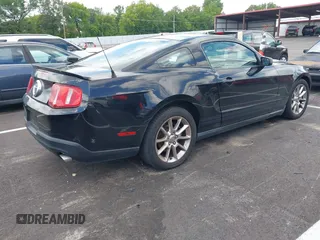 2011 Ford Mustang V6 with VIN 1ZVBP8AM5B5149026, listed as a IAAI auction lot 42551126 with 230,429 mi miles and . Bid and sale history available at DreamBid. Image 4.