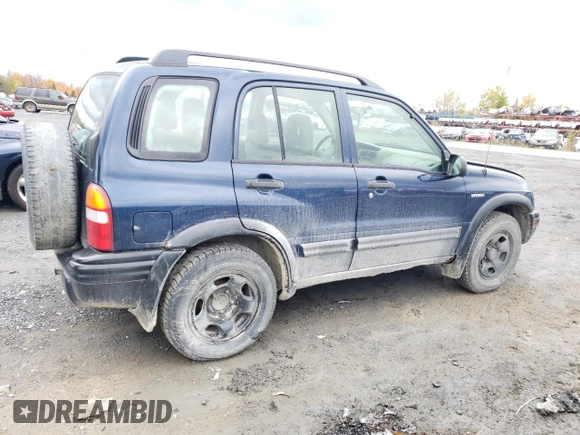 2004 Suzuki Vitara z VIN 2S3TD62VX46100019, wystawiony jako Copart lot #74291684 z przebiegiem 148 566 mil mil oraz Szkoda całkowita • Salvage title. Historia ofert i sprzedaży dostępna na DreamBid. Obrazek 3.