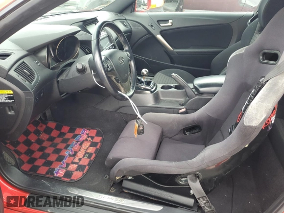 2013 Hyundai Genesis Coupe Premium z VIN KMHHT6KD3DU086928, wystawiony jako Copart lot #55731185 z przebiegiem 101 092 mil mil oraz Szkody całkowita. Historia ofert i sprzedaży dostępna na DreamBid. Obrazek 7.