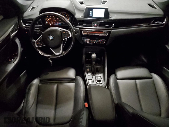 2018 BMW X1 xDrive28i with VIN WBXHT3C30J5K29917, listed as a Copart auction lot 56165845 with 131,876 mi miles and Salvage title. Bid and sale history available at DreamBid. Image 8.