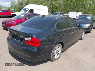 2008 BMW 3 Series 328xi with VIN WBAVC73518KP39386, listed as a IAAI auction lot 39828477 with 188,917 mi miles. Bid and sale history available at carsss.com. Image 4.
