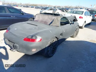1998 Porsche Boxster z VIN WP0CA2982WU621935, wystawiony jako IAAI lot #41838363 z przebiegiem Nie podano mil oraz . Historia ofert i sprzedaży dostępna na DreamBid. Obrazek 4.