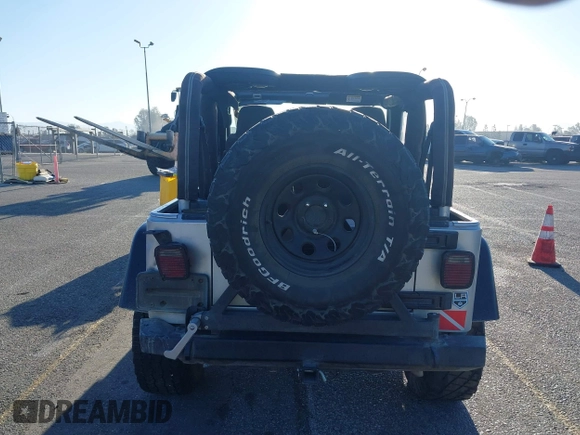 2005 Jeep Wrangler X with VIN 1J4FA39S55P348432, listed as a IAAI auction lot 41868451 with 166,876 mi miles. Bid and sale history available at carsss.com. Image 16.