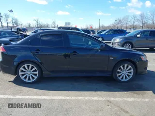 2008 Mitsubishi Lancer GTS z VIN JA3AU86U68U029426, wystawiony jako IAAI lot #41747832 z przebiegiem 183 830 mil mil oraz . Historia ofert i sprzedaży dostępna na DreamBid. Obrazek 13.