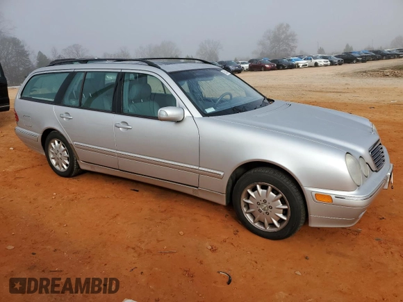 2001 Mercedes-Benz E-Class AWD with VIN WDBJH82J81X048600, listed as a Copart auction lot 85530364 with 172,950 mi miles and Salvage Title. Bid and sale history available at carsss.com. Image 4.