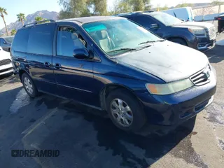 2004 Honda Odyssey EX with VIN 5FNRL18614B080980, listed as a IAAI auction lot 41940014 with 233,465 mi miles and . Bid and sale history available at DreamBid. Image 1.