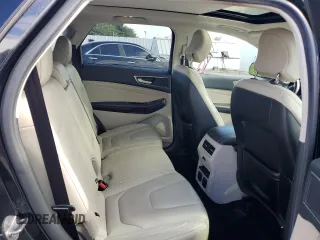 2015 Ford Edge Titanium z VIN 2FMTK4K86FBB88124, wystawiony jako Copart lot #57392305 z przebiegiem 95 698 mil mil oraz Szkoda całkowita • Salvage title. Historia ofert i sprzedaży dostępna na DreamBid. Obrazek 10.