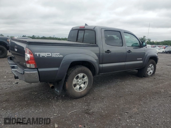 2015 Toyota Tacoma with VIN 3TMLU4EN6FM203591, listed as a Copart auction lot 58518185 with 149,729 mi miles and Salvage title. Bid and sale history available at DreamBid. Image 3.