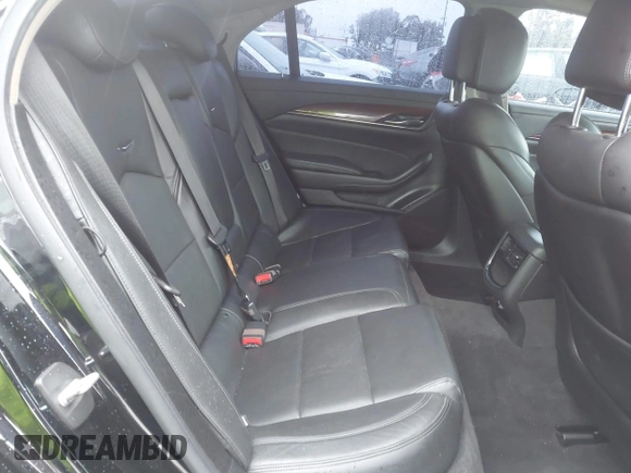 2014 Cadillac CTS Luxury AWD with VIN 1G6AX5SX3E0156938, listed as a IAAI auction lot 41574318 with 151,585 mi miles and . Bid and sale history available at DreamBid. Image 8.