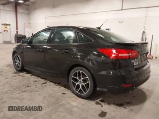 2015 Ford Focus SE with VIN 1FADP3F24FL255450, listed as a IAAI auction lot 41673301 with 103,650 mi miles. Bid and sale history available at carsss.com. Image 3.