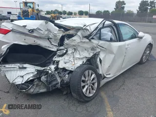 2014 Lexus ES 300h z VIN JTHBW1GG2E2050313, wystawiony jako IAAI lot #42145939 z przebiegiem 114 143 mil mil oraz . Historia ofert i sprzedaży dostępna na DreamBid. Obrazek 4.