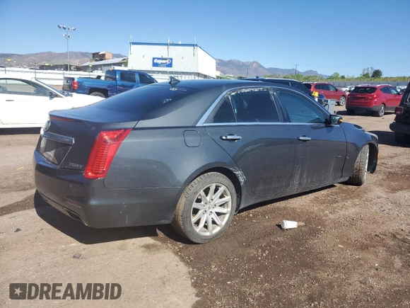 2014 Cadillac CTS AWD with VIN 1G6AW5SX2E0141060, listed as a Copart auction lot 57281445 with 137,904 mi miles and Salvage title. Bid and sale history available at DreamBid. Image 3.