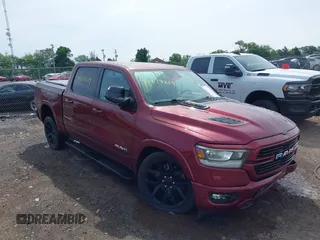 2022 Ram 1500 Laramie with VIN 1C6SRFJT0NN333200, listed as a IAAI auction lot 42217219 with 27,332 mi miles and . Bid and sale history available at DreamBid. Image 1.