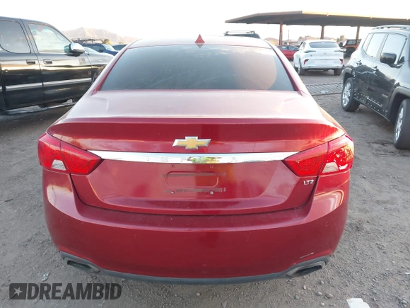 2014 Chevrolet Impala LTZ z VIN 1G1155S32EU141591, wystawiony jako IAAI lot #42150675 z przebiegiem Nie podano mil oraz . Historia ofert i sprzedaży dostępna na DreamBid. Obrazek 16.