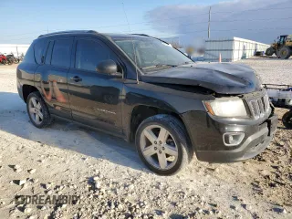 2014 Jeep Compass High Altitude with VIN 1C4NJCEA9ED889158, listed as a Copart auction lot 45805095 with 104,981 mi miles and Salvage Title. Bid and sale history available at carsss.com. Image 4.