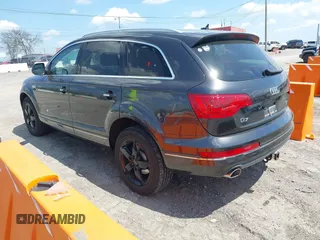 2014 Audi Q7 Premium Plus with VIN WA1LMAFE5ED020880, listed as a IAAI auction lot 42010201 with 123,384 mi miles and . Bid and sale history available at DreamBid. Image 3.