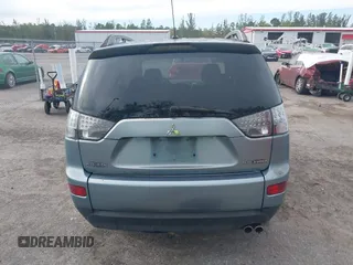 2007 Mitsubishi Outlander XLS z VIN JA4MS41X57Z016273, wystawiony jako IAAI lot #38897236 z przebiegiem 165 376 mil mil oraz . Historia ofert i sprzedaży dostępna na DreamBid. Obrazek 16.